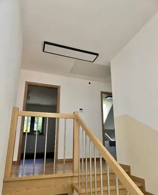 a staircase with a skylight in a house at Widokówka Kudłacze Domek z Jacuzzi in Pcim