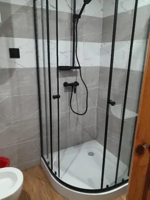 a bathroom with a toilet and a sink at apartament przytulny in Ogrodzieniec