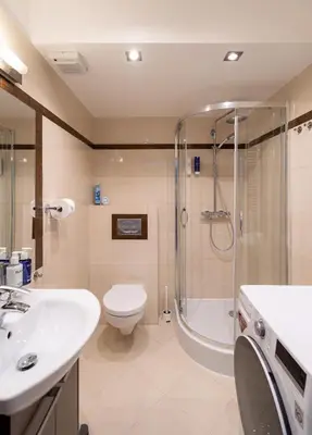 a bathroom with a shower and a toilet and a sink at Tarlowska - Free Parking - Near Castle, Main Square & River - 3 bedroom, loggia, 2xTV 4K in Kraków
