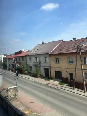 a street with houses on the side of the road at Słoneczna Pleszowska in Kraków