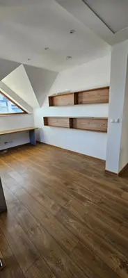 an empty room with wooden floors and ceilings at Villa Kozikowka lake and forest near Krakow and Wieliczka in Ulesie