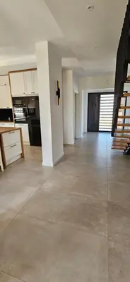 an empty living room with a kitchen and stairs at Villa Kozikowka lake and forest near Krakow and Wieliczka in Ulesie