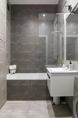a bathroom with a tub and a sink and a shower at Travelers Haven Spacious 70m2 2 Bedrooms Balcony Old Town Area in Kraków