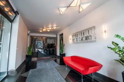 a bedroom with a bed and a large window at Lux 2bed, Wawel Castle, parking in Kraków