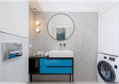 a bathroom with a sink and a washing machine at Apartament Rodzinny w Centrum Krakowa by Noclegi Renters in Kraków