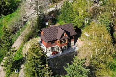 an overhead view of a house in the woods at Gorczańska Chata Lubomierz in Lubomierz