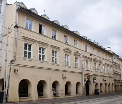 a large building on the side of a street at Stradom Studio in Kraków