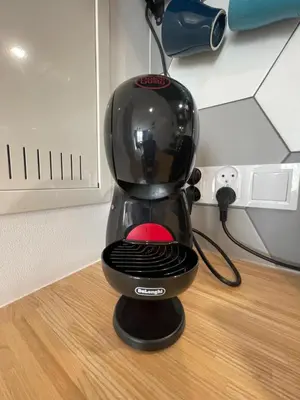 a mixer sitting on top of a wooden floor at Sunflower Apartment Bałuckiego Street in Kraków