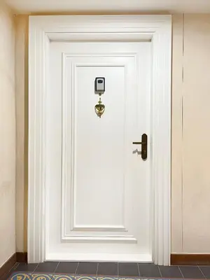 a white door with a security camera on it at Studio Premium with Air Conditioning for couples in the heart of Krakow, Main Square in Kraków