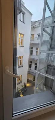 a view of a building from a window at M Apartment Bosacka 7 in Kraków