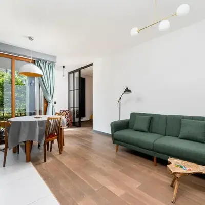 Jesionowa Homely Apartment with Garden by BookingHost