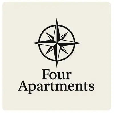 a four apartments logo on a white background at Four Apartaments Daszyńskiego in Kraków