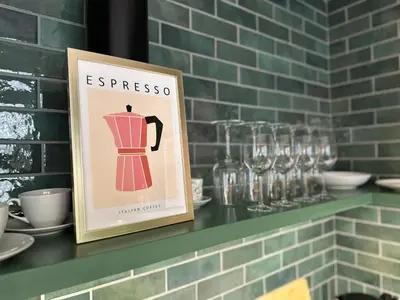 a picture of a dress on a shelf with glasses at Heron Apartment - Old Town Kraków in Kraków