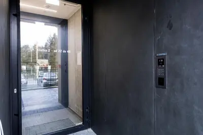 an entrance to a building with a revolving door at Native Apartments Kościuszki 39I27 in Kraków