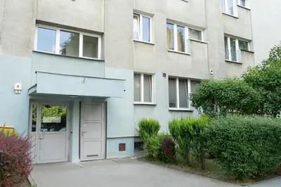 a building with a door in front of it at Apartment Azory in Kraków
