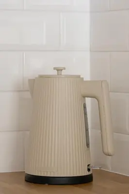 a white tea kettle sitting on top of a counter at Apartment with Balcony - Łobzowska 57 street in Kraków
