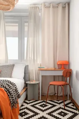 a bedroom with a bed and a desk and a window at OSKA Apartment near Expo, Tauron Arena in Kraków