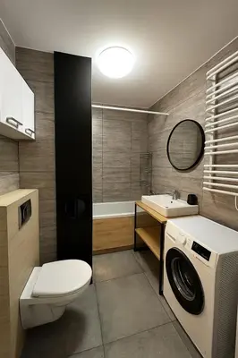 a bedroom with two beds and a green and white wall at Lust&Desire BDSM Krakow Apartment in Kraków