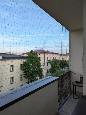 a balcony with a view of a building at Apartament na Kazimierzu in Kraków
