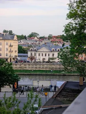 a view of a city with buildings and a river at Apartament na Kazimierzu in Kraków