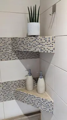 two vases sitting on a shelf in a bathroom at Kaszmir Sky Apartment by Vistula River in Kraków
