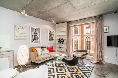 a living room with a couch and a table at Krakow Old Town - 47m2, Top location - by Rentujemy in Kraków