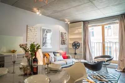 a living room with a couch and a table at Krakow Old Town - 47m2, Top location - by Rentujemy in Kraków