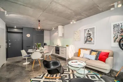a living room with a couch and a table at Krakow Old Town - 47m2, Top location - by Rentujemy in Kraków