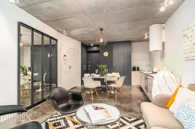 a living room with a couch and a table at Krakow Old Town - 47m2, Top location - by Rentujemy in Kraków
