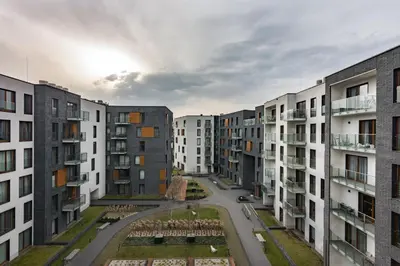 arial view of an apartment complex with buildings at NEARTOpl Rakowicka Family apartments in Kraków