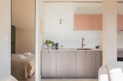 a kitchen with a sink and a counter at Venus Apartment in Kraków
