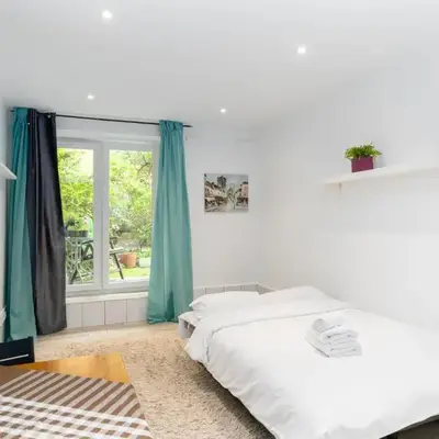 Park Krakowski Homely Studio with Garden by BookingHost