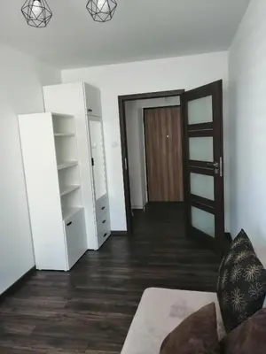 an empty room with a closet and a door at Fajny Apartament EXPO TAURON ARENA in Kraków