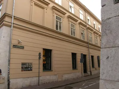 a building on the side of a street at Apartament Jagielloński in Kraków