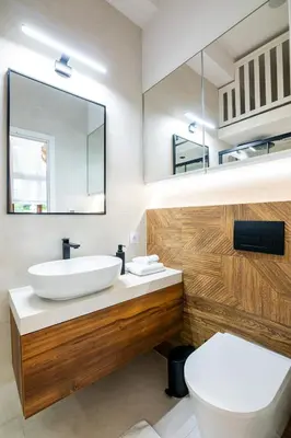 a bathroom with a sink and a toilet at PAUL-IN-SKY Apartment Krakow in Kraków