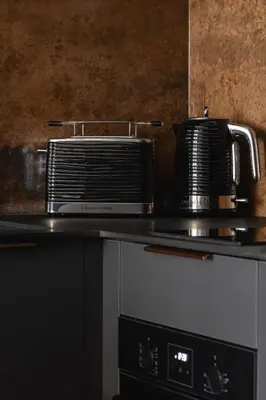 a toaster oven sitting on top of a counter at Modern & Luxurious Apartment with Balcony & Parking Cracow by Renters Prestige in Kraków
