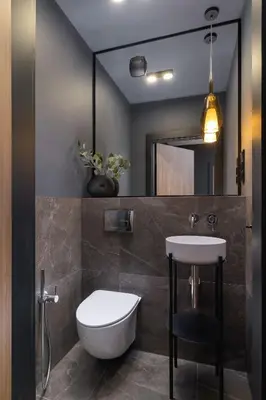 a bathroom with a sink and a toilet and a mirror at Modern & Luxurious Apartment with Balcony & Parking Cracow by Renters Prestige in Kraków
