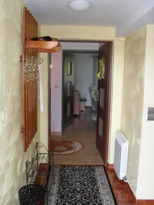 a hallway with a door leading into a room at Noclegi u Zosi in Staniątki
