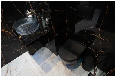 an overhead view of a bathroom with a toilet and a sink at Jacuzzi Glass-House Rakowicka 20 Central Station in Kraków
