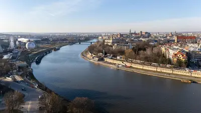 a view of a river in a city at Przedwiośnie Chic Harmony Apartment by BookingHost in Kraków