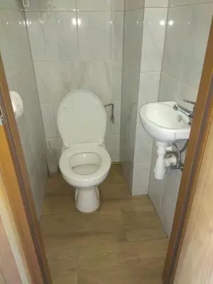 a bathroom with a toilet and a sink at Grodzisko11 in Skała
