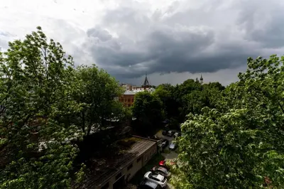 an overhead view of a city with trees and cars at Old Town Wooden Loft Apartment by BookingHost in Kraków