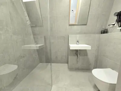 a bathroom with a sink and a toilet at Royal Kątowa Apartment in Kraków
