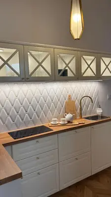 a kitchen with a sink and a counter top at Golden Age Apartment Cracow in Kraków
