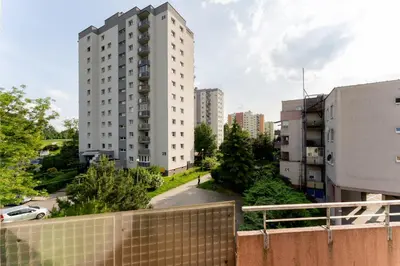 a view from the balcony of a building at Osiedle Oświecenia Comfort Apartment by BookingHost in Kraków