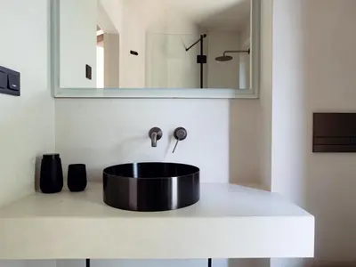 a bathroom with a sink and a mirror at Babiogórska Stodoła in Zawoja