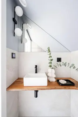 a bathroom with a sink and a mirror at Osada Tabaszowa in Tabaszowa