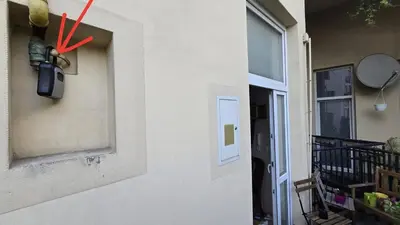 a door to a house with a red x on it at ATELIER Kazimierz in Kraków