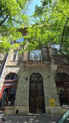 a building with two doors and a balcony at ATELIER Kazimierz in Kraków