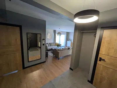 a bedroom with a sliding door to a closet at Chill House in Zator